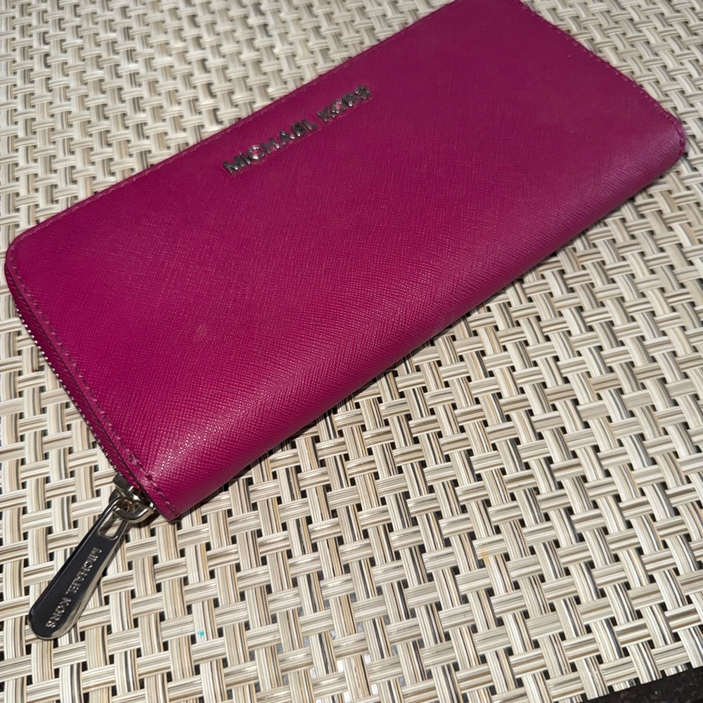 Michael Kors Pink Wallet good condition never used it.